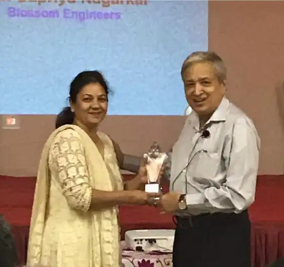 Mrs. Supriya Nagarkar of Blossom Engineers receiving KiTEC's National Highest Sales Award